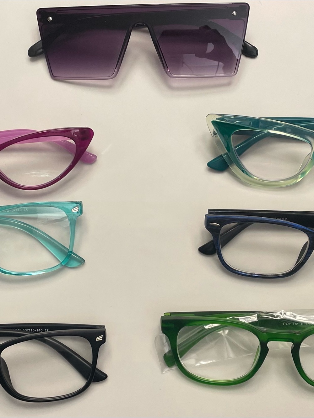 Lot of 7, One Pair of Sunnies and Six Readers +1.50